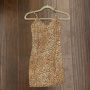 Sketchy form fitting Cheetah Dress